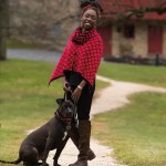 Hawa’s reversible black/red cape and infinity scarf are from Festoon. 