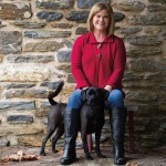 Wendy’s two-button, flyaway cardigan is from Festoon. 