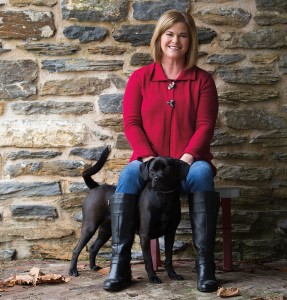 Wendy’s two-button, flyaway cardigan is from Festoon.