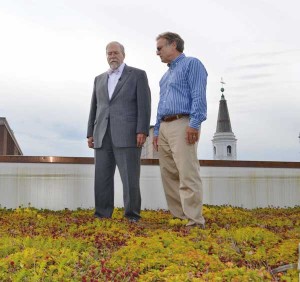 Mayor Rick Gray (left) and Gordy Kautz survey the “living roof” that was installed atop Lancaster City Hall’s 18,000-square-foot annex.  