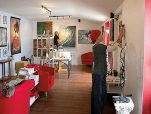 Kenny Kidd and Loryn Spangler-Jones prepare Annex 24 for a new exhibit.