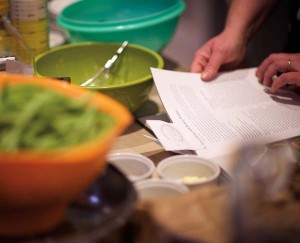 Carol and Pete do all the prepping and provide the cooking teams with the ingredients and directions they need to finish their courses.