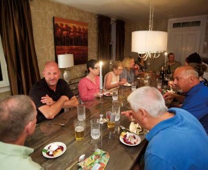 Enjoying the dessert course around the dining room table.