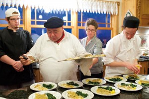 The Elia family – Salvatore, Nino, Elizabeth and Francesco – worked in tandem to create the dinner that took its inspiration from Nino’s native Sicily. Here, they plate the third course: fillet of sole “oreganata” and sautéed spinach.