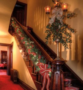 Guests for last year’s house tour were greeted by this festively decorated staircase. 