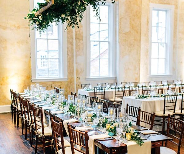 The king’s table concept has become a reception-dinner favorite with couples.