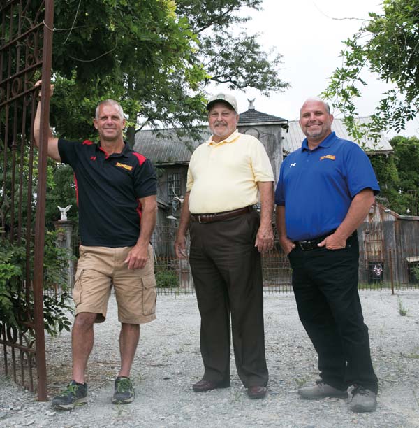 Like their father, Ed (center), Gene (left) and Jim (right) Schopf became teachers and farmers. They probably inherited their love of entertaining the 100,000 guests who visit Field of Screams each year from him, as well.