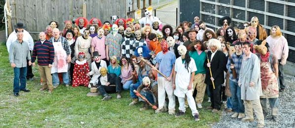 Gene and Jim posed with their ever-growing cast of characters in 2013.