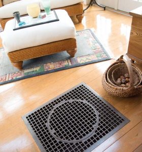 "The sitting room is cozy when it snows,” she adds. The iron grate is one of Elaine’s finds, plus it is functional, as warm air from the lower level filters through it and heats the room.