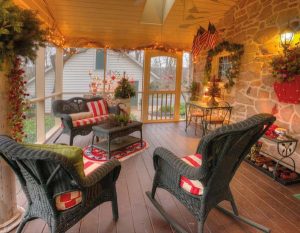 The screened porch is another of Elaine’s favorite spaces. She uses it long into fall.