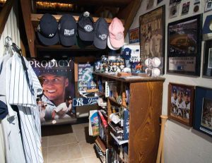 A nook under the staircase is devoted to Elaine’s beloved New York Yankees. Favorite memories include attending the game that clinched the 2009 World Series (against the Phillies), the last game played at the old Yankee Stadium, one of the first games played in the new stadium and the game in which Derek Jeter earned his 3,000th hit. She was also in attendance for Derek Jeter Day. Elaine was also a participant in the Yankees’ first Women’s Mini Fantasy Camp (2011). Apple TV allows her to view all of the Yankees’ games.