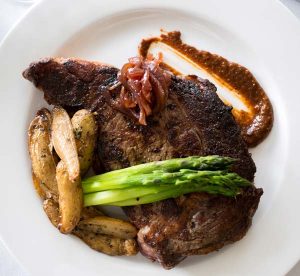 Steak remains an integral part of the menu. And, a burger has been added to the menu. 