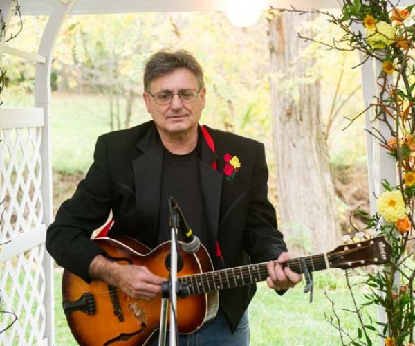 Stu Huggens stepped in to provide the pre-ceremony music when the CD player failed to operate.