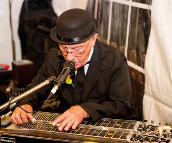 It’s not often that the father of the bride is a member of the band that provides entertainment. Leo Derstler has been a member of Stu Huggens’ various bands for years.