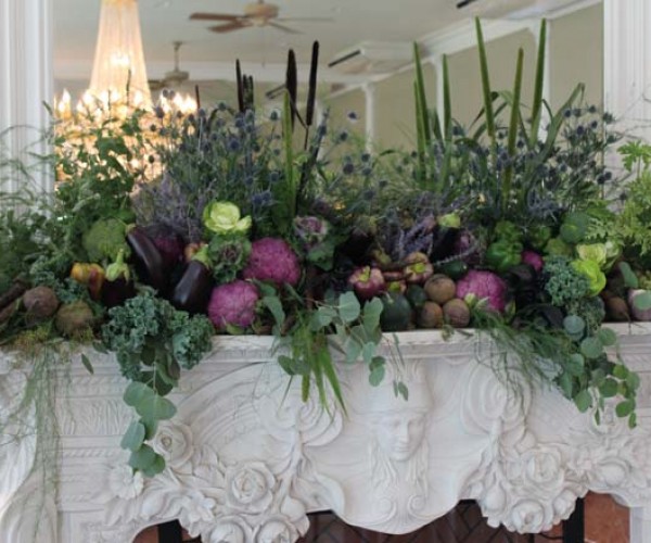 The inn’s fireplaces and dining tables were topped with arrangements that included ornamental cabbage, kale, organic vegetables, eucalyptus, thistle, reeds, fiddlehead ferns and herbs.