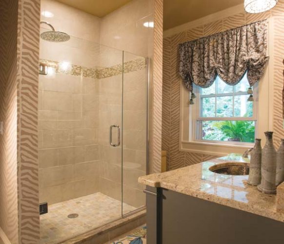 The existing second-floor bathroom was redesigned to accommodate a spa-like shower (it replaced a claw-foot tub) and full laundry.