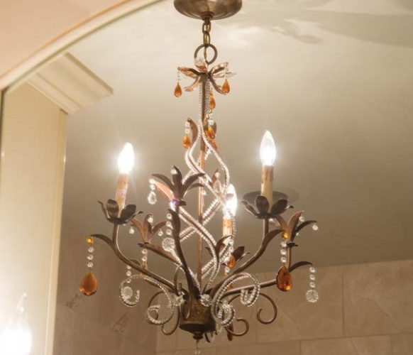 This chandelier has followed Sheri from home to home. It now hangs in the master bathroom.