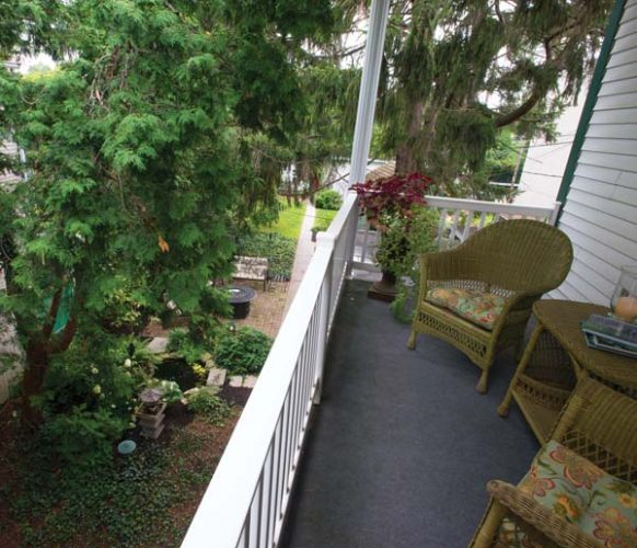 The balcony off the master suite provides a relaxing spot for starting or ending the day. It offers a commanding view of the gardens and backyard. 4. Sheri’s shop and studio fill the space that was once home to Koser Jewelers.