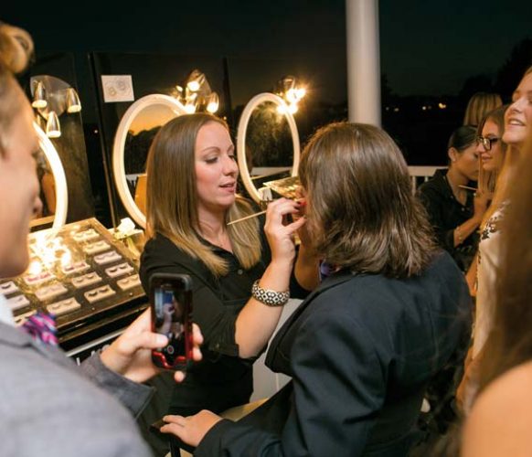Professional makeup artists provided fun assistance – including pink eyelashes and henna tattoos – to party goers.