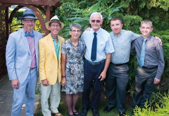 James (left) and Tim (yellow jacket) were thrilled that Tim’s parents, Judy and Jerry Arpin, and nephews, Cameron and Parker, could visit from Kansas and Colorado and attend the party.